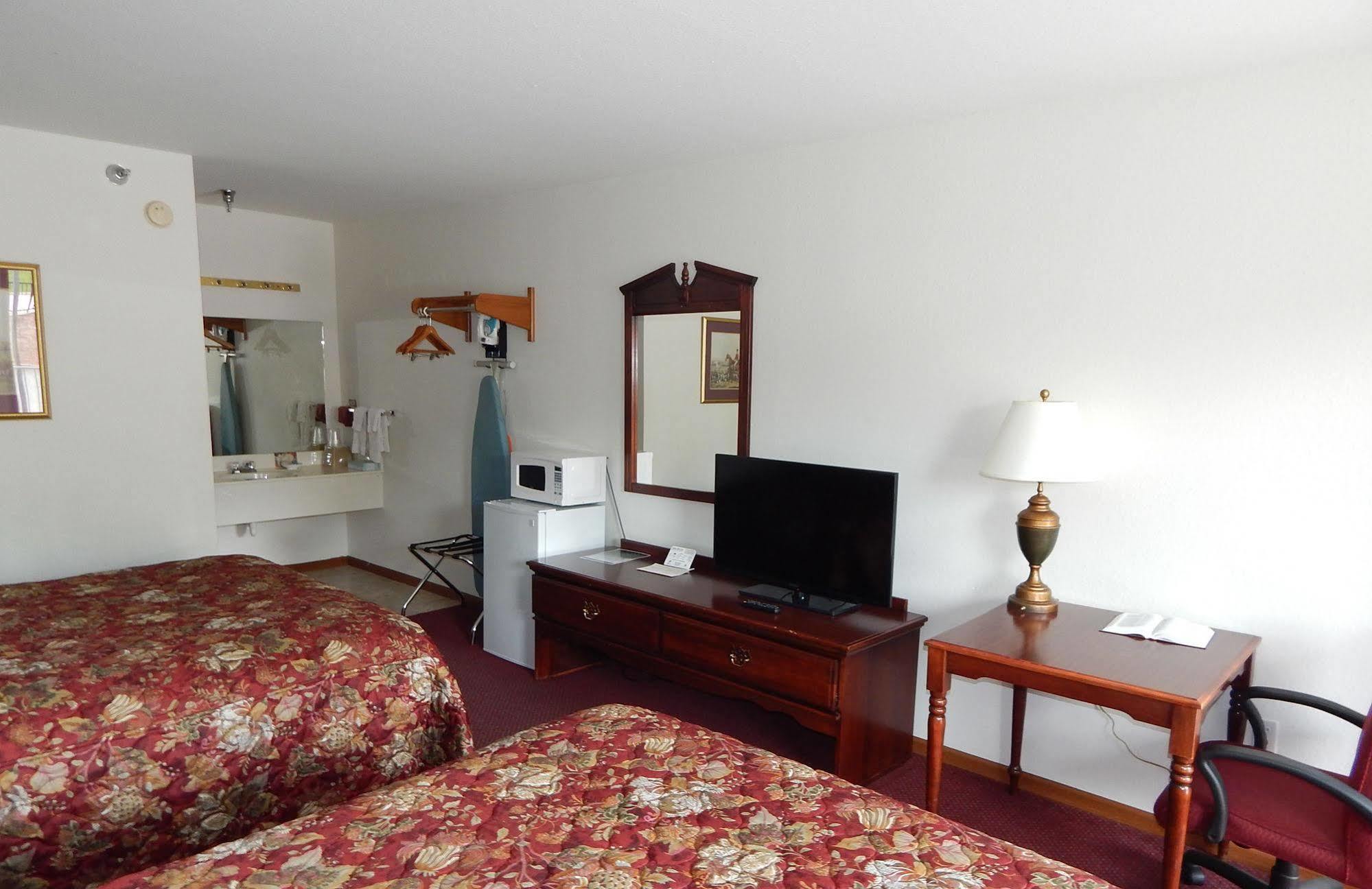 Carriage House Inn Брэнсон Экстерьер фото